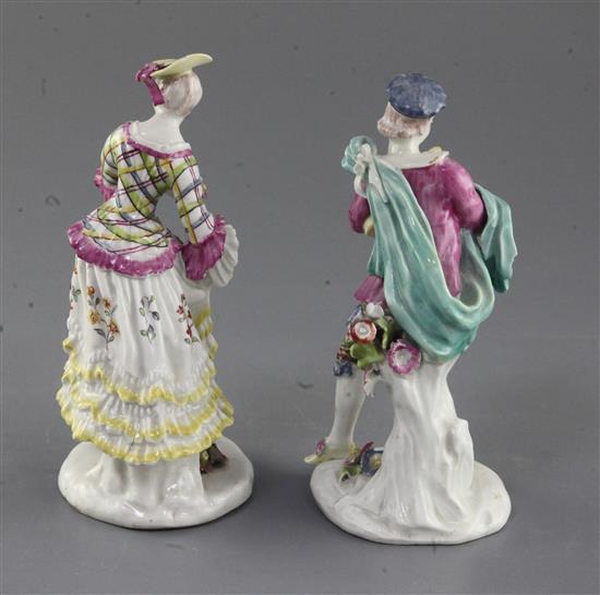 A pair of early Derby figures of a bagpiper and female companion, c.1756-7, h. 15.5cm and 16.5cm, bagpipers neck repaired
